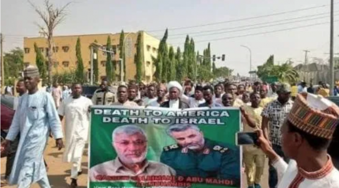 UK warns its citizens in Nigeria as protesters burn US flag