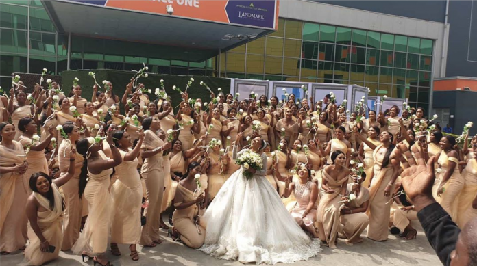 Linda Ikeji's Sister Breaks Guinness World Record With 200 Bridesmaids