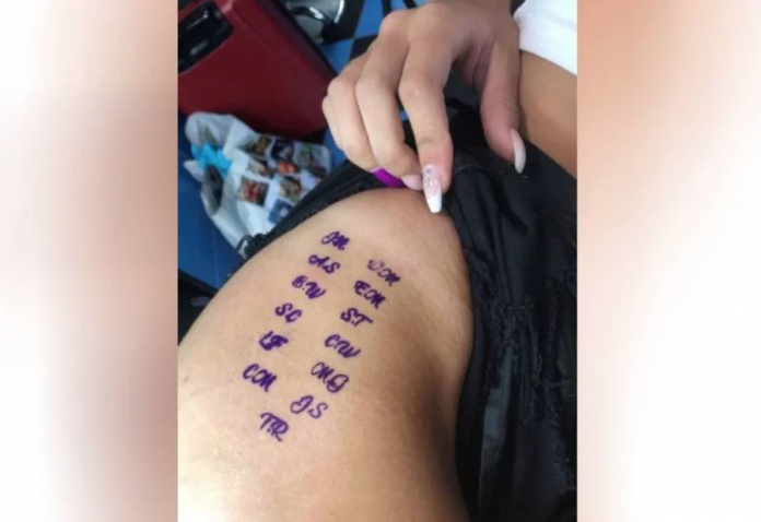 Woman finds names of seven men tattooed on her leg after a boozy night